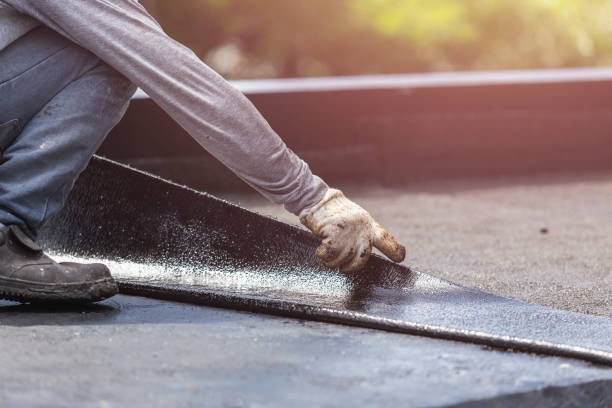 Professional Basement Waterproofing technician working in Neapolis, OH